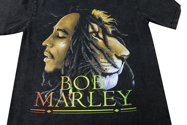 t-shirt lion dreadlocks avec impression de Bob Marley et un lion sur fond noir