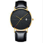 montre masculine étanche quartz créative avec boîtier doré et bracelet en cuir noir.