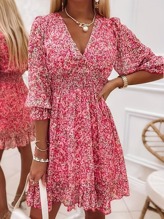 Robe imprimée à col en V avec manches et taille à volants
