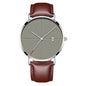 Montre masculine étanche quartz créative avec boîtier en acier inoxydable et bracelet en cuir marron.