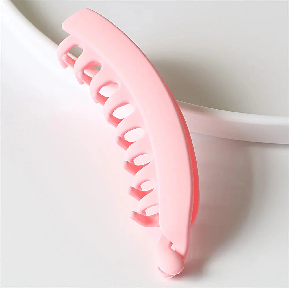 Barrettes cheveux banane couleur unie en plastique rose, clip à cheveux durable et élégant pour femmes.