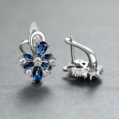 Boucles d'oreilles en zircon en forme de goutte avec des pierres bleues et blanches en argent