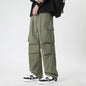 pantalons d'été en soie glacée pour hommes couleur armée avec poches, style décontracté.