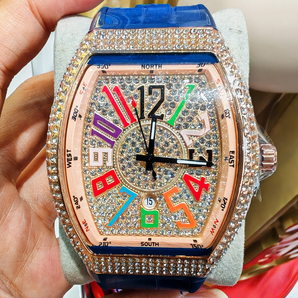 Montre minimaliste en cuir avec accents en diamant, bracelet bleu, cadran décoré de strass et chiffres colorés.