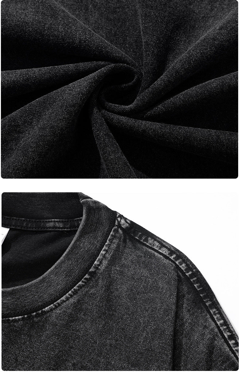 Détails du t-shirt lion dreadlocks en tissu noir, montrant la texture et le col.