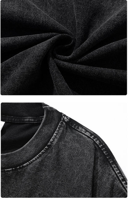 Détails du t-shirt lion dreadlocks en tissu noir, montrant la texture et le col.