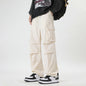 pantalons d'été en soie glacée pour hommes avec poches, coupe décontractée, couleur crème.