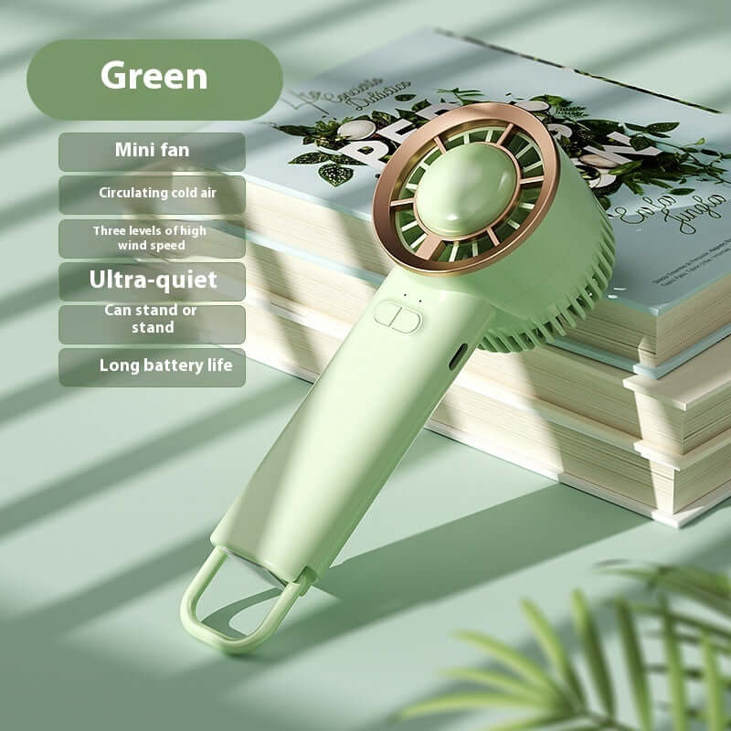 Mini portable fan in green with digital display, featuring ultra-quiet operation and three speed settings.